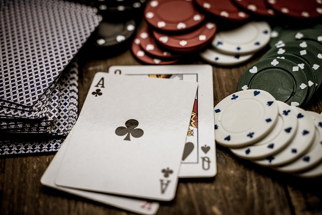 Dynamic shot of casino chips and cards on a table, symbolizing winning