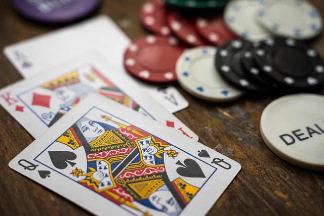 Friends playing poker around a stylish casino table in a home setting
